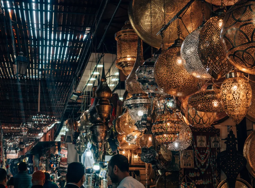 The famous oriental lamps of Morocco, hanging in one of the souks of the ancient medina of Marrakech, Magic of Morocco Walk, Guided by Nature